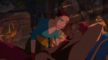 Movie still from “Sinbad: Legend of the Seven Seas” (2003), directed by Tim Johnson – A woman standing next to a man laying on a bed; Medium shot, Overhead angle