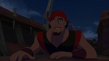 Movie still from “Sinbad: Legend of the Seven Seas” (2003), directed by Tim Johnson – A man with a red hat is looking at the camera; Medium shot, Low angle