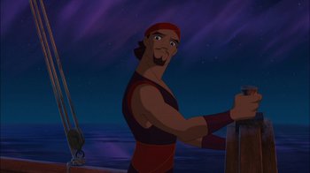 Movie still from “Sinbad: Legend of the Seven Seas” (2003), directed by Tim Johnson – A man standing on a boat in front of a body of water at night; Medium shot, Over the shoulder angle