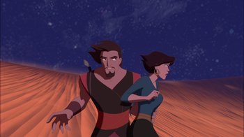 Movie still from “Sinbad: Legend of the Seven Seas” (2003), directed by Tim Johnson – An animated man and a woman are standing in the desert; Medium shot, Low angle