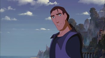 Movie still from “Sinbad: Legend of the Seven Seas” (2003), directed by Tim Johnson – A man with long black hair wearing a blue shirt; Close Up shot, Over the shoulder angle