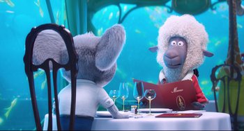 Movie still from “Sing” (2016), directed by Christophe Lourdelet – Two animated characters sitting at a dinner table; Medium shot, Over the shoulder angle