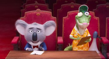 Movie still from “Sing” (2016), directed by Christophe Lourdelet – Two cartoon characters sitting at a table in a movie theater; Medium shot, Over the shoulder angle