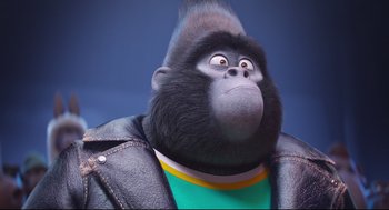 Movie still from “Sing” (2016), directed by Christophe Lourdelet – A gorilla wearing a leather jacket; Close Up shot, Low angle