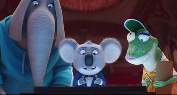 Movie still from “Sing” (2016), directed by Christophe Lourdelet – A koala , an elephant , and an alligator; Medium shot, Low angle