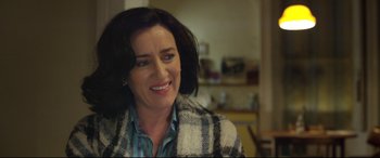 Movie still from “Sing Street” (2016), directed by John Carney – A person wearing a jacket; Close Up shot, Over the shoulder angle