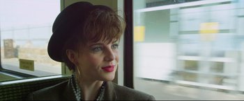 Movie still from “Sing Street” (2016), directed by John Carney – A person wearing a jacket; Close Up shot, Over the shoulder angle
