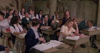 Movie still from “Sister Act 2: Back in the Habit” (1993), directed by Bill Duke – A group of people sitting at desks in a classroom; Wide shot, High angle