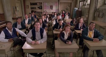 Movie still from “Sister Act 2: Back in the Habit” (1993), directed by Bill Duke – A group of students sitting at their desks in a classroom; Wide shot, High angle