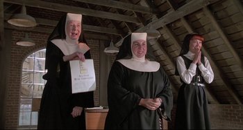 Movie still from “Sister Act 2: Back in the Habit” (1993), directed by Bill Duke – A group of women dressed in nun's clothing; Medium shot, Low angle