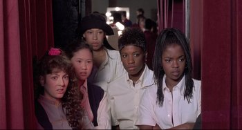 Movie still from “Sister Act 2: Back in the Habit” (1993), directed by Bill Duke – A group of young women standing next to each other in a room; Close Up shot, High angle