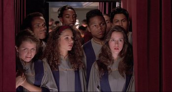 Movie still from “Sister Act 2: Back in the Habit” (1993), directed by Bill Duke – A group of people standing next to each other; Close Up shot, High angle
