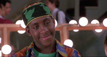 Movie still from “Sister Act 2: Back in the Habit” (1993), directed by Bill Duke – A person wearing a hat; Close Up shot, Low angle