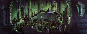 Movie still from “Sleeping Beauty” (1959), directed by Wolfgang Reitherman – A large group of people sitting in front of a stage; Extreme Wide shot, High angle