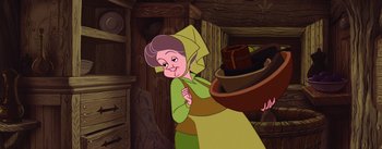 Movie still from “Sleeping Beauty” (1959), directed by Wolfgang Reitherman – An old woman is standing in front of a wooden wall; Close Up shot, Over the shoulder angle