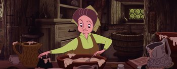 Movie still from “Sleeping Beauty” (1959), directed by Wolfgang Reitherman – An old woman is cooking something in a bowl; Close Up shot, High angle