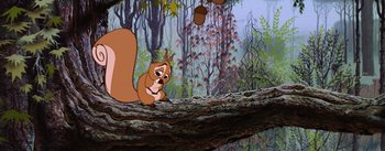 Movie still from “Sleeping Beauty” (1959), directed by Wolfgang Reitherman – An animated squirrel sitting on top of a tree branch; Wide shot, High angle