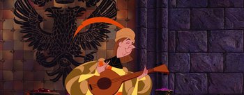 Movie still from “Sleeping Beauty” (1959), directed by Wolfgang Reitherman – A man with a hat is holding a guitar; Medium shot, Over the shoulder angle