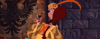 Movie still from “Sleeping Beauty” (1959), directed by Wolfgang Reitherman – A man dressed as a musketeer holding a glass of wine; Medium shot, Overhead angle