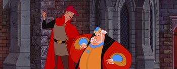 Movie still from “Sleeping Beauty” (1959), directed by Wolfgang Reitherman – A man in a red robe is standing next to another man in a red robe; Medium shot, Over the shoulder angle