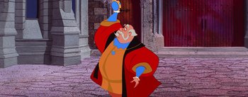 Movie still from “Sleeping Beauty” (1959), directed by Wolfgang Reitherman – A man in a red robe holding a mirror; Medium shot, Low angle