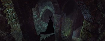 Movie still from “Sleeping Beauty” (1959), directed by Wolfgang Reitherman – A picture of a dark room with a castle like setting; Wide shot, High angle