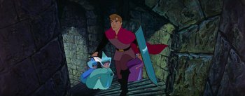 Movie still from “Sleeping Beauty” (1959), directed by Wolfgang Reitherman – A man holding a sword next to a girl and a boy; Wide shot, High angle