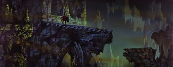 Movie still from “Sleeping Beauty” (1959), directed by Wolfgang Reitherman – A man standing on top of a stone bridge; Extreme Wide shot, Low angle