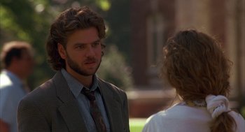 Movie still from “Sleeping with the Enemy” (1991), directed by Joseph Ruben – A man and a woman are talking outside; Close Up shot, Over the shoulder angle