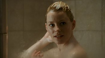 Movie still from “Slither” (2006), directed by James Gunn – A woman is taking a shower in the bathroom; Close Up shot, Over the shoulder angle