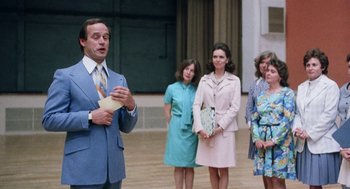 Movie still from “Smile” (1975), directed by Michael Ritchie – A group of people standing in front of each other; Medium shot, Low angle