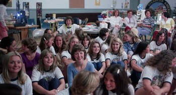 Movie still from “Smile” (1975), directed by Michael Ritchie – A group of women sitting in a room together; Wide shot, High angle