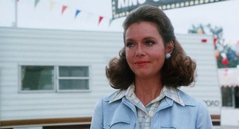 Movie still from “Smile” (1975), directed by Michael Ritchie – A person wearing a jacket; Close Up shot, Low angle