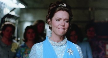Movie still from “Smile” (1975), directed by Michael Ritchie – A person wearing a blue dress; Close Up shot, Low angle