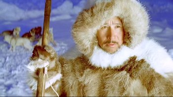 Movie still from “Smilla's Sense of Snow” (1997), directed by Bille August – A man wearing a fur coat and a fur hat; Close Up shot, High angle