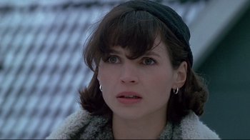 Movie still from “Smilla's Sense of Snow” (1997), directed by Bille August – A person wearing a hat; Close Up shot, High angle