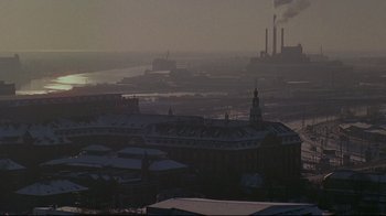 Movie still from “Smilla's Sense of Snow” (1997), directed by Bille August – A view of a large city with snow on the ground; Extreme Wide shot, High angle