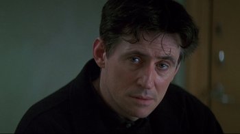 Movie still from “Smilla's Sense of Snow” (1997), directed by Bille August – A person wearing a black shirt; Close Up shot, Over the shoulder angle