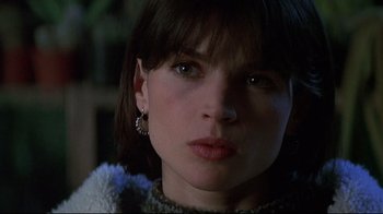 Movie still from “Smilla's Sense of Snow” (1997), directed by Bille August – A person wearing a sweater; Close Up shot, Low angle