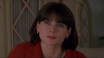 Movie still from “Smilla's Sense of Snow” (1997), directed by Bille August – A person wearing a red sweater; Close Up shot, High angle