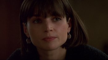 Movie still from “Smilla's Sense of Snow” (1997), directed by Bille August – A person wearing a black shirt; Close Up shot, Over the shoulder angle