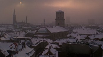 Movie still from “Smilla's Sense of Snow” (1997), directed by Bille August – A view of a snowy roofed city from above; Extreme Wide shot, Low angle