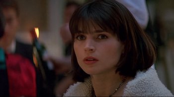 Movie still from “Smilla's Sense of Snow” (1997), directed by Bille August – A person with a candle; Close Up shot, High angle