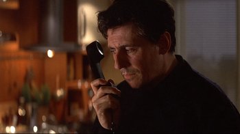 Movie still from “Smilla's Sense of Snow” (1997), directed by Bille August – A person holding a hair dryer; Close Up shot, Low angle