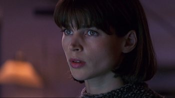 Movie still from “Smilla's Sense of Snow” (1997), directed by Bille August – A person with short brown hair; Close Up shot, Low angle