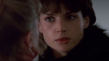 Movie still from “Smilla's Sense of Snow” (1997), directed by Bille August – A woman's face as she stares into the camera; Close Up shot, Over the shoulder angle