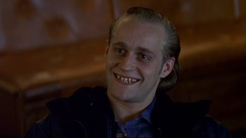 Movie still from “Smilla's Sense of Snow” (1997), directed by Bille August – A person smiling; Close Up shot, Low angle