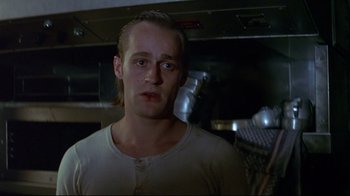 Movie still from “Smilla's Sense of Snow” (1997), directed by Bille August – A person with long hair; Close Up shot, Low angle