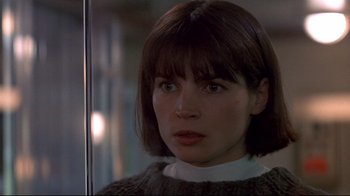 Movie still from “Smilla's Sense of Snow” (1997), directed by Bille August – A person wearing a sweater; Close Up shot, Over the shoulder angle
