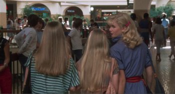 Movie still from “Smooth Talk” (1985), directed by Joyce Chopra – A group of young girls standing in a crowd; Medium shot, Over the shoulder angle